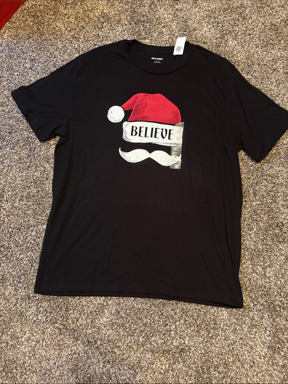 Old Navy Black Tee with Red Santa Hat 'Believe' Graphic